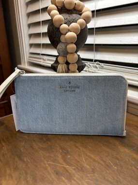 kate spade light blue denim zip-around wristlet